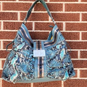 Sharif snake skin, leather, man made material bag.